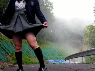 Perverted schoolgirls are captivated by outdoor exposure masturbation on an abandoned road
