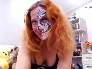 witch makeup on Halloween night redhead girl tease legs in stockings