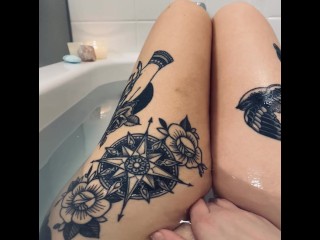 tattooed alt girl plays with her pussy in the bath