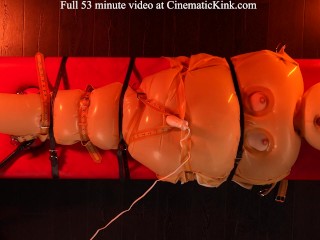 Anna Kovachenko in inflatable latex sack