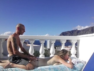 A massage turns into outdoor balcony fuck beside beautiful mountains