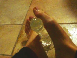 Ariel Ortiz gives a good footjob to her largest transparent dildo