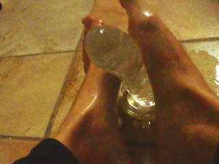 Ariel Ortiz gives a good footjob to her largest transparent dildo