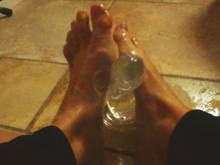 Ariel Ortiz gives a good footjob to her largest transparent dildo