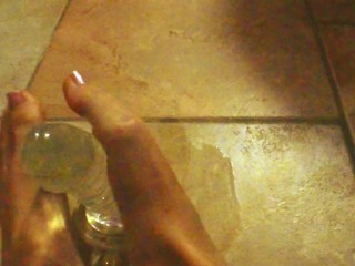 Ariel Ortiz gives a good footjob to her largest transparent dildo