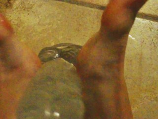 Ariel Ortiz gives a good footjob to her largest transparent dildo