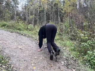 girl in high-heeled boots wants to go to home, but there is dirty slippery slide on the way