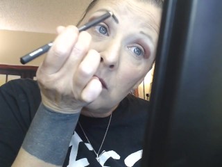 Doing Make up Dangling a Cigarette Cork Full Flavor