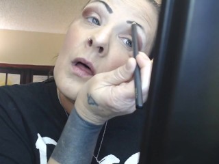 Doing Make up Dangling a Cigarette Cork Full Flavor