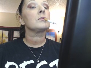 Doing Make up Dangling a Cigarette Cork Full Flavor