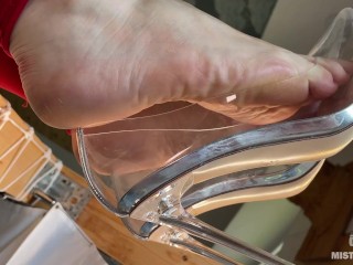 Mistress Legs dangling transparent high heel shoes on my bare feet, closeup foot fetish