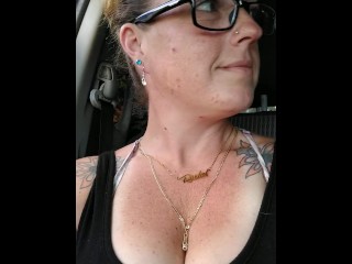 Girl films up her own black minidress and teases with her panties in public while I am driving