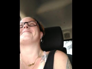 Girl films up her own black minidress and teases with her panties in public while I am driving