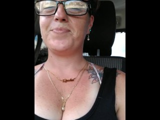 Girl films up her own black minidress and teases with her panties in public while I am driving