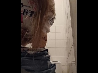 Pissing in the public toilet with other woman