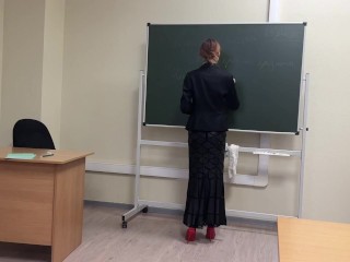 teacher is teaching a lesson at school, but one of students look only on her sexy shoes and heels