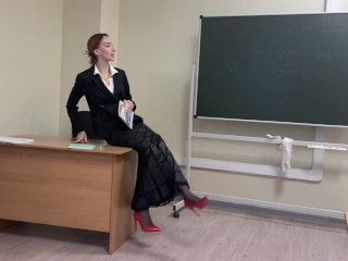 teacher is teaching a lesson at school, but one of students look only on her sexy shoes and heels