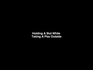 Holding A Slut While  Taking A Piss Outside