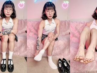 Cute, fit Asian girl shares her honest thoughts on foot fetishes and takes off her shoes and socks