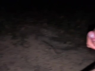 Masturbating in the woods at night