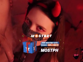 She-devil gives a blowjob on her knees