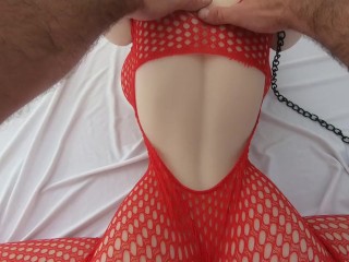 Teasing Sex Doll wearing fishnet body suit and leash. Il