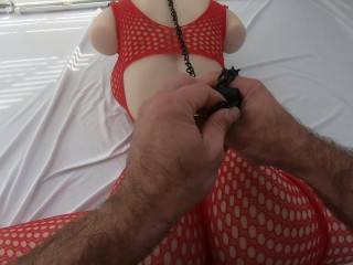 Teasing Sex Doll wearing fishnet body suit and leash. Il