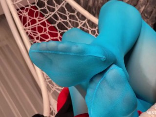 Mistress foot teasing you in hanging chair in white dirty socks and blue tights