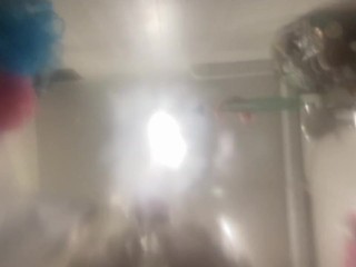 A man pisses on your face in the bathroom