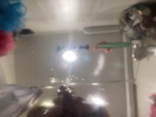 A man pisses on your face in the bathroom