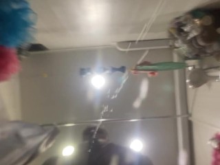 A man pisses on your face in the bathroom