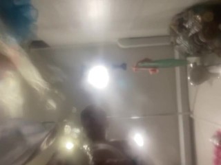 A man pisses on your face in the bathroom