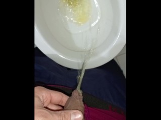 Desperate young man pissing, big erection and sprouted veins