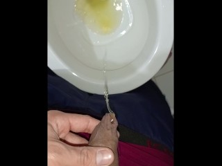 Desperate young man pissing, big erection and sprouted veins