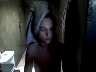 Hot redhead takes a shower; and pees