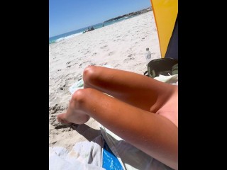 Teen couple on public beach and she touches his thin penis in front of strangers