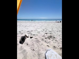 Teen couple on public beach and she touches his thin penis in front of strangers