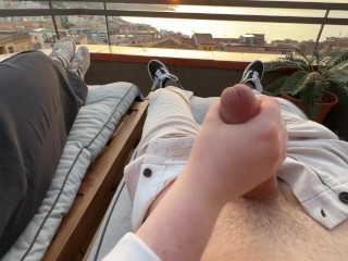 Horny handjob at sunset with a view over the bay