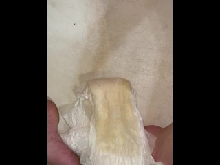 Girl pisses diaper while smoking