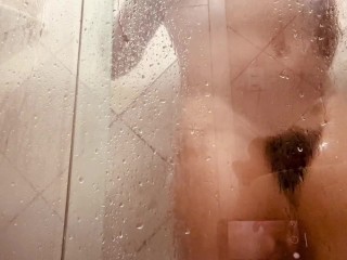 Girl being filmed while taking a shower, showing off her hairy pussy.  What she likes to do most is