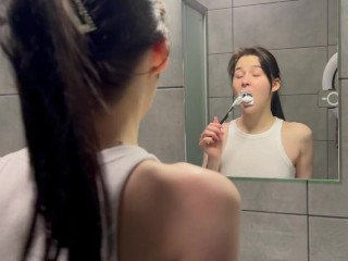 Hot brunette is getting ready for bed