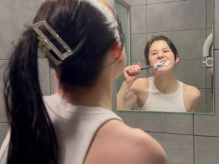 Hot brunette is getting ready for bed