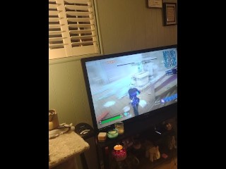 Step mom lifts up her minidress and spreads her legs and plays Fortnite