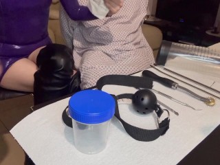 Misstress Nastya tries her new toys on his slave while wearing gynegological latex gloves