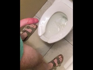 Hung guy freeballing at casino, big dick got hard so took off pants in bathroom and squirted a load.