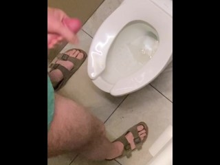 Hung guy freeballing at casino, big dick got hard so took off pants in bathroom and squirted a load.