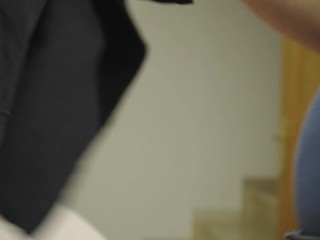 I'm ironing clothes in a blue T-shirt