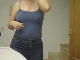 I'm ironing clothes in a blue T-shirt