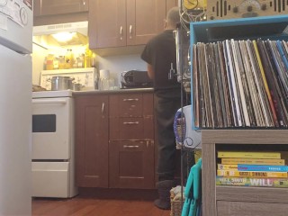 Bachelor undress while doing dishes.