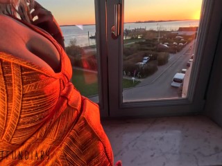 sexy lady in tight bodycon dress fucked standing doggystyle risky sundowner window